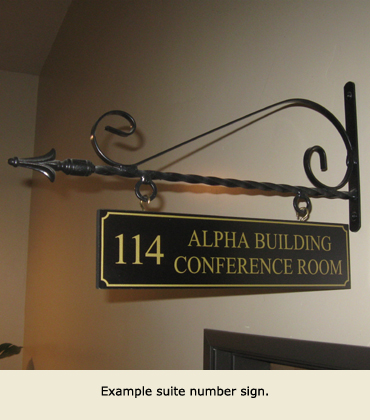 Example suite number sign in the Alpha Building, Grass Valley, CA, where office suites are for lease.