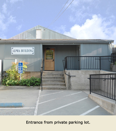 Rear entrance to Grass Valley's Alpha Building, where suites are for lease.